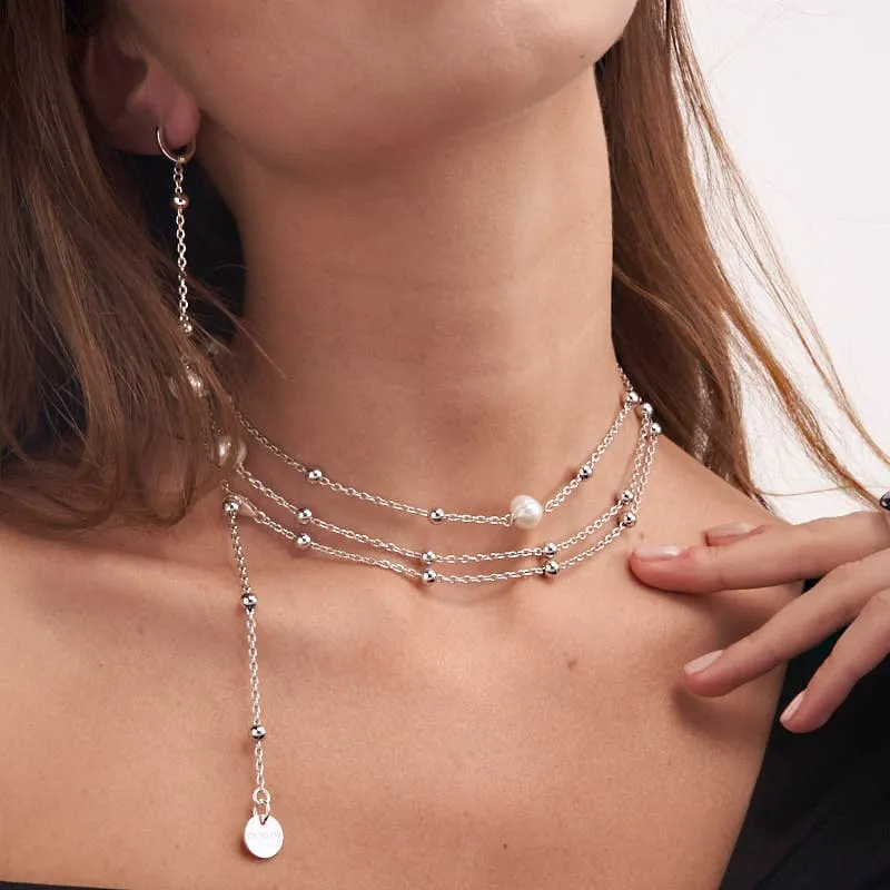 Collana di catena e perle naturali